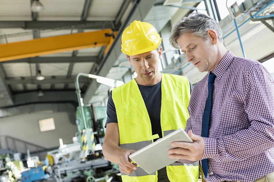 supervisor reviewing plans